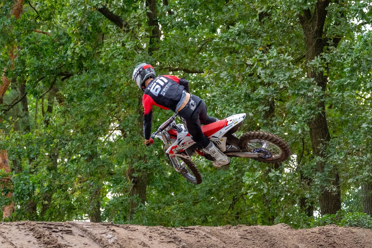 Markuss Kokins #611 in the air on his motocross bike